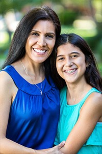 Mother and Daughter with Braces Smiling