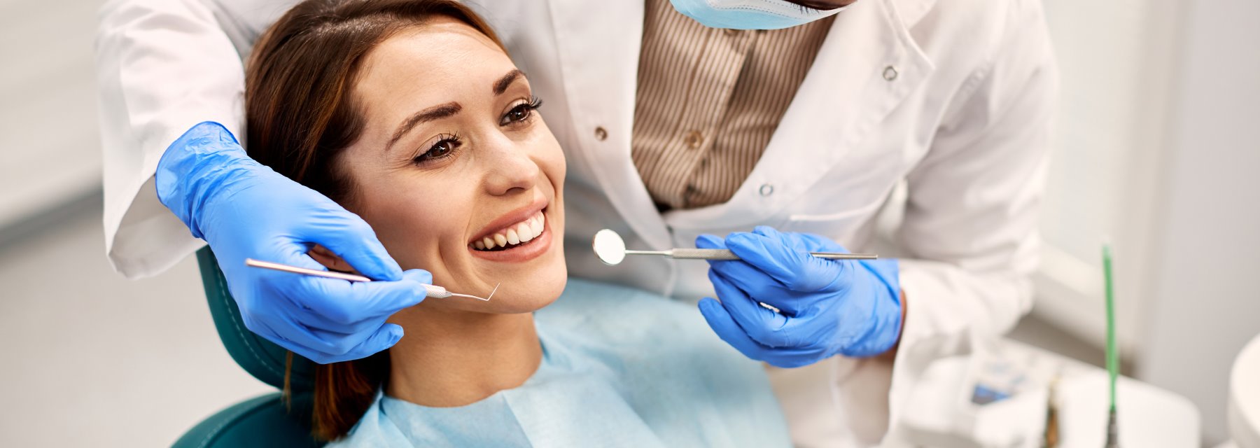 Woman Receiving A Dental Cleaning From A Dentist at Meadville Pennsylvania