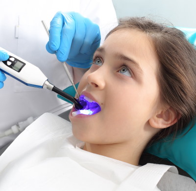 Young Girl Sitting In A Dental Chair at Meadville Pennsylvania